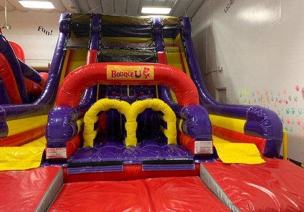 BounceU Oranage Vertical Rush Inflatable in Arena